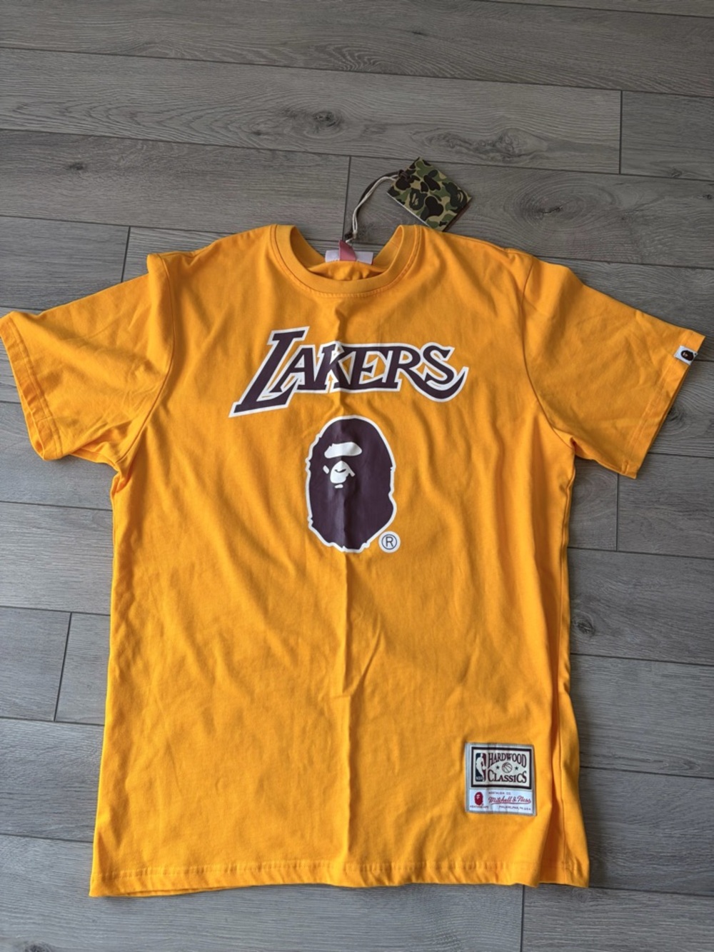 Bape x Mitchell & Ness Gold Hardwood Classics Patch Tee Lakers